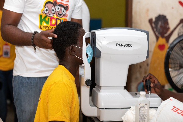 A beneficiary undergoing free eye test